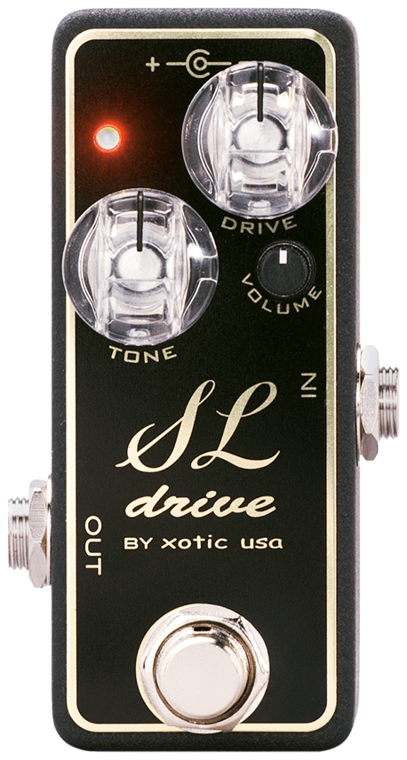 Xotic SL Drive, top-down view, black mini enclosure, gold script logo, clear Tone and Drive knobs