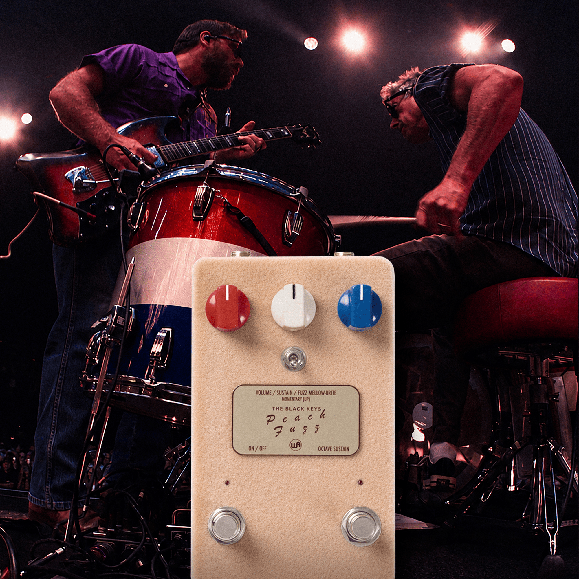 Warm Audio The Black Keys Peach Fuzz pedal in front of a live Black Keys stage scene
