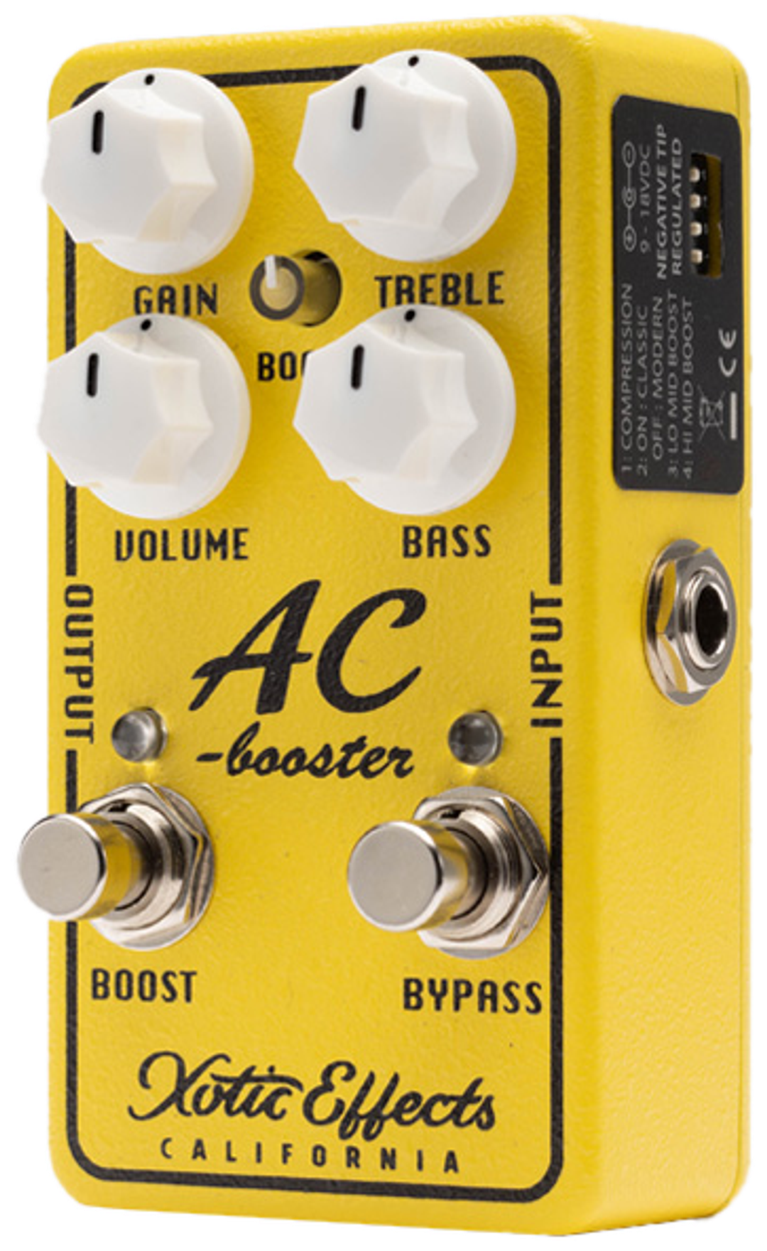 Xotic AC Booster V2, three-quarter view, yellow enclosure, white knobs, Boost and Bypass footswitches