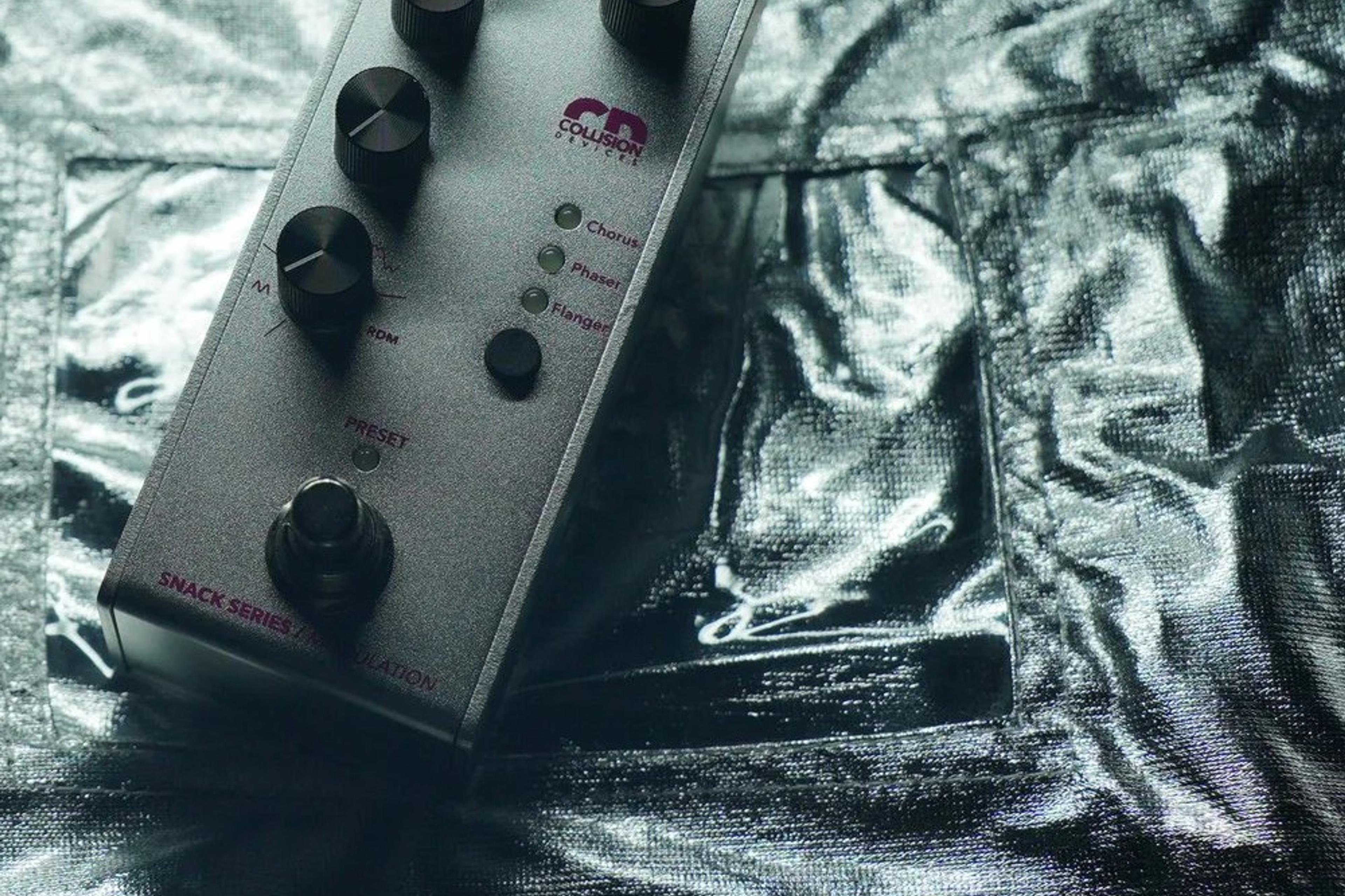 Collision Devices Snack Modulation on a crinkled foil surface, official lifestyle photo