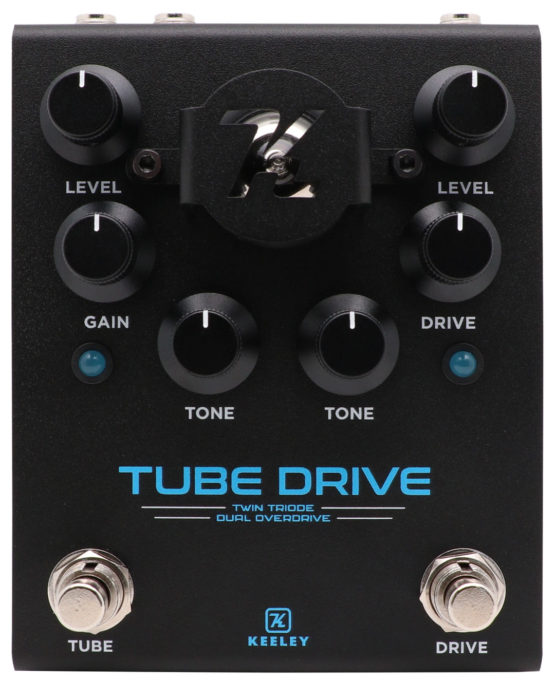 Keeley Tube Drive Twin Triode Dual Overdrive top view, matte black enclosure with central tube shroud, six knobs, and Tube and Drive footswitches