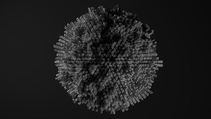 Monochromes 3D-Objekt mit strukturierten Würfeln auf dunklem Hintergrund.