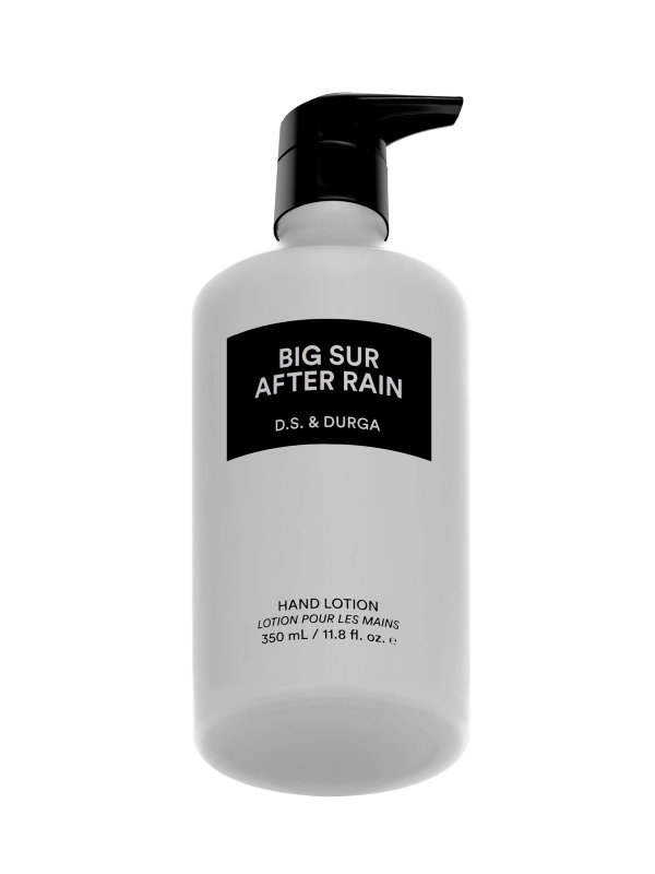 A sleek white bottle of hand lotion with a pump labeled "Big Sur After Rain" by D.S. & Durga containing 400 ml / 13.5 fl. oz.