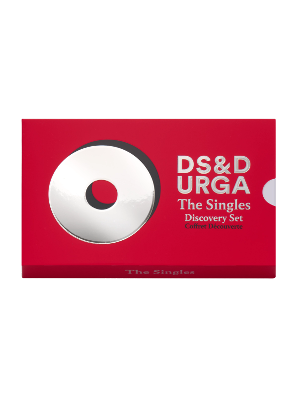 Rectangular red box with a white circular design on the left and text on the right that reads “DS&amp;D URGA The Singles Discovery Set Coffret Découverte.”