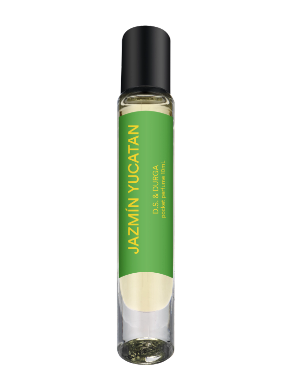 A sleek rollerball perfume bottle with a green label that reads "jazmin yucatan" by d.s. &amp; durga. 