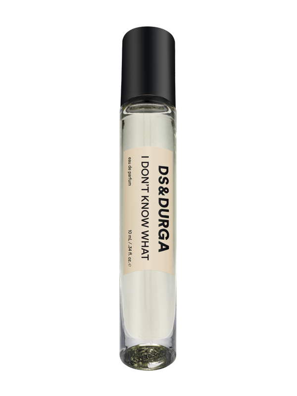 A sleek 10 mL travel size perfume spray bottle labeled “I Don’t Know What” by d.s. & durga, with a black cap and cream label.