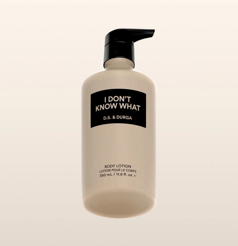 A sleek cream bottle of body lotion with a pump labeled "I Don't Know What" by D.S. & Durga on a neutral background.