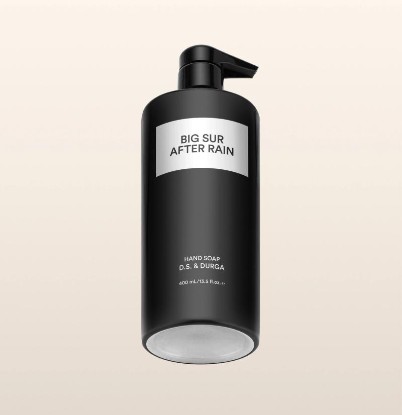 A sleek black bottle of hand soap with a pump labeled "Big Sur After Rain" by D.S. & Durga on a neutral background.