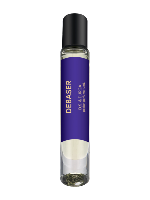 A sleek rollerball perfume bottle with a purple label that reads "debaser" by d.s. &amp; durga. 