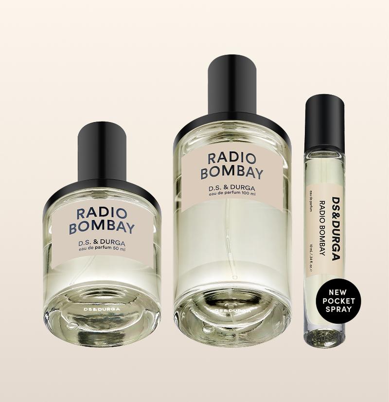 Three sleek bottles of "radio bombay” eau de parfum by d.s. & durga, in varying sizes.