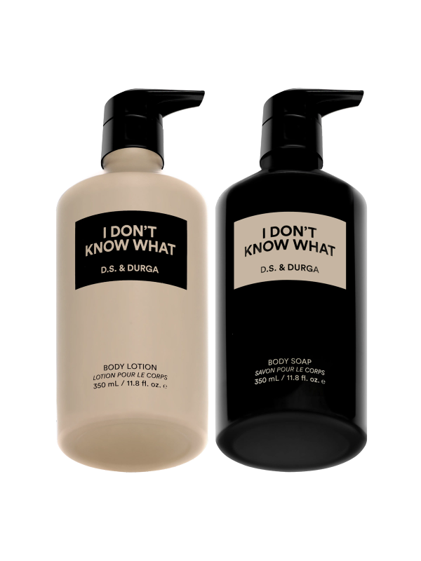 Two aluminum bottles labeled "I Don't Know What" by D.S. & Durga, one body soap and one body lotion.