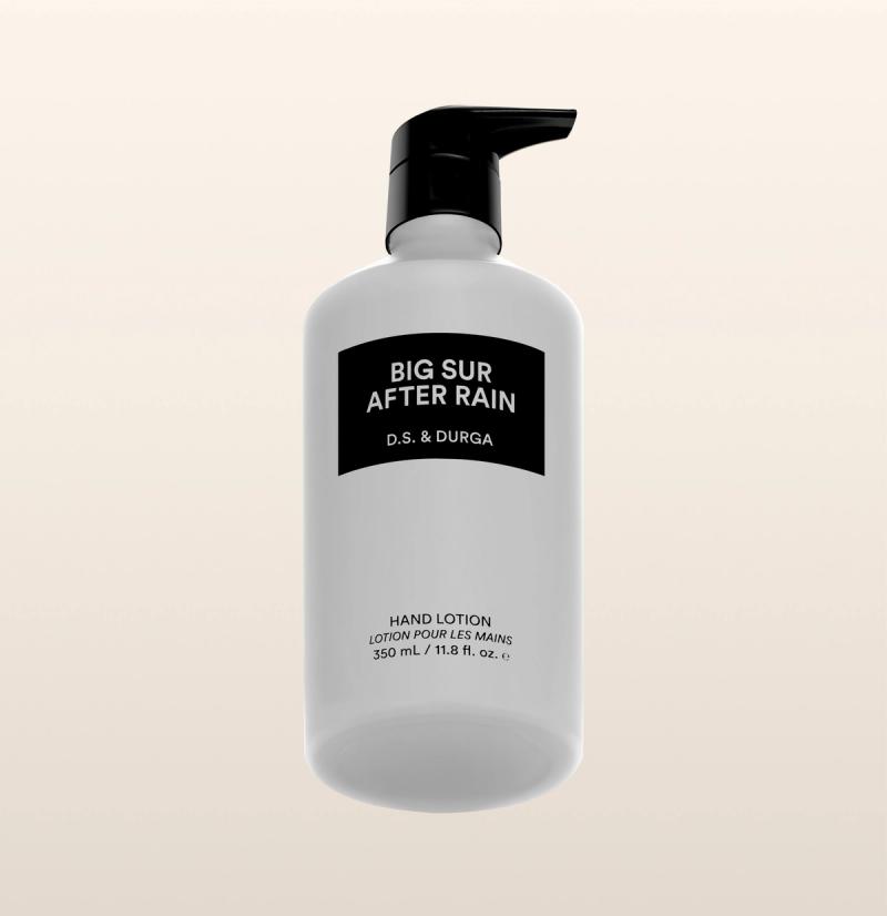 A sleek white bottle of hand lotion with a pump labeled "Big Sur After Rain" by D.S. & Durga on a neutral background.