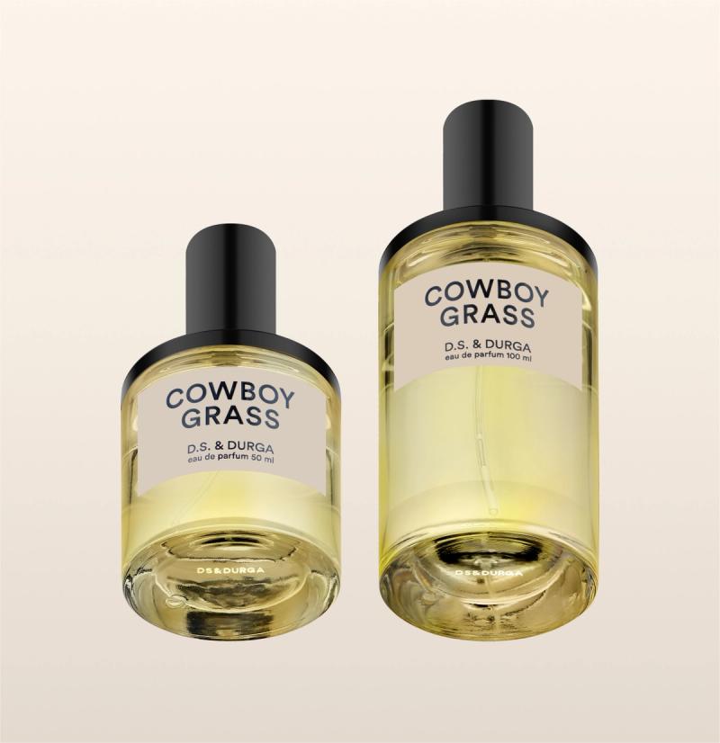 Two bottles of "cowboy grass"  perfume by d.s. & durga in varying sizes. 