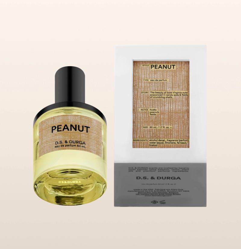 Bottle of "peanut" eau de parfum, 50 ml size next to its packaging.
