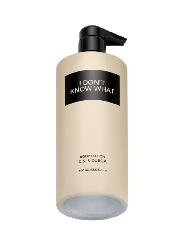 A sleek cream bottle of body lotion with a pump labeled "I Don't Know What" by D.S. & Durga containing 400 ml / 13.5 fl. oz.