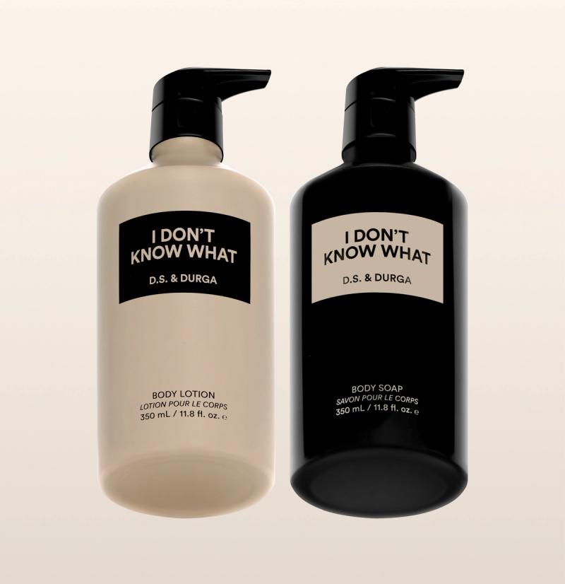 Two aluminum bottles labeled "I Don't Know What" by D.S. & Durga, one body soap and one body lotion against a neutral background.