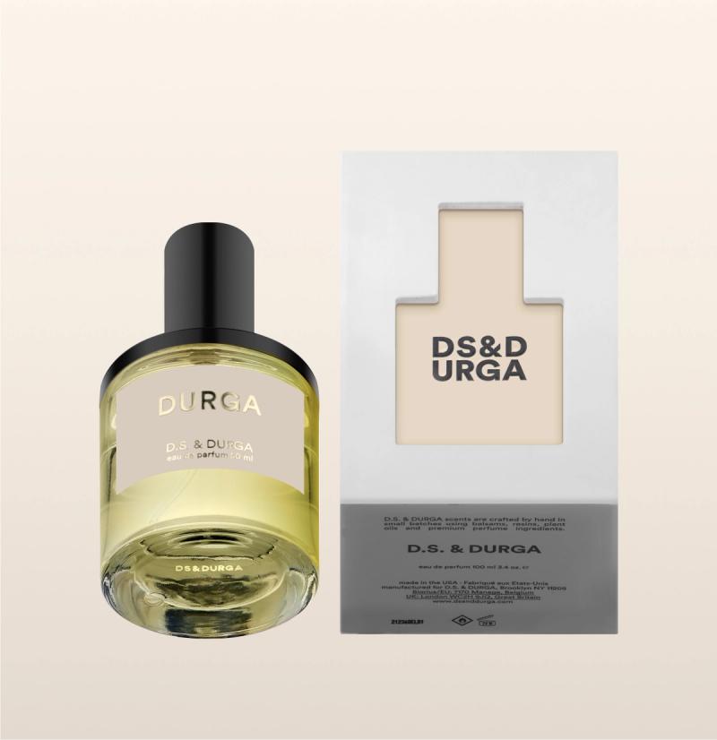 Bottle of "durga" eau de parfum, 50 ml size next to its packaging.