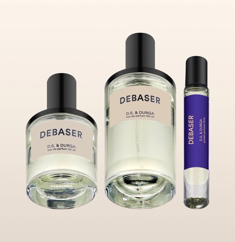 Three sleek bottles of "debaser” eau de parfum by d.s. &amp; durga, in varying sizes.