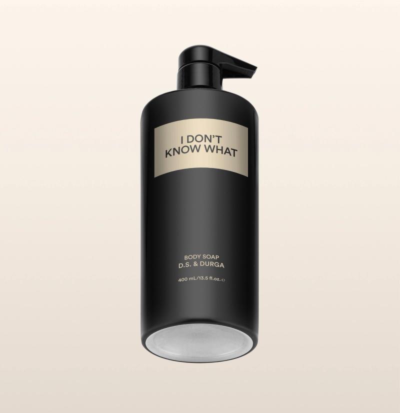 A sleek black bottle of body soap with a pump labeled "I Don't Know What" by d.s. & durga on a neutral background.