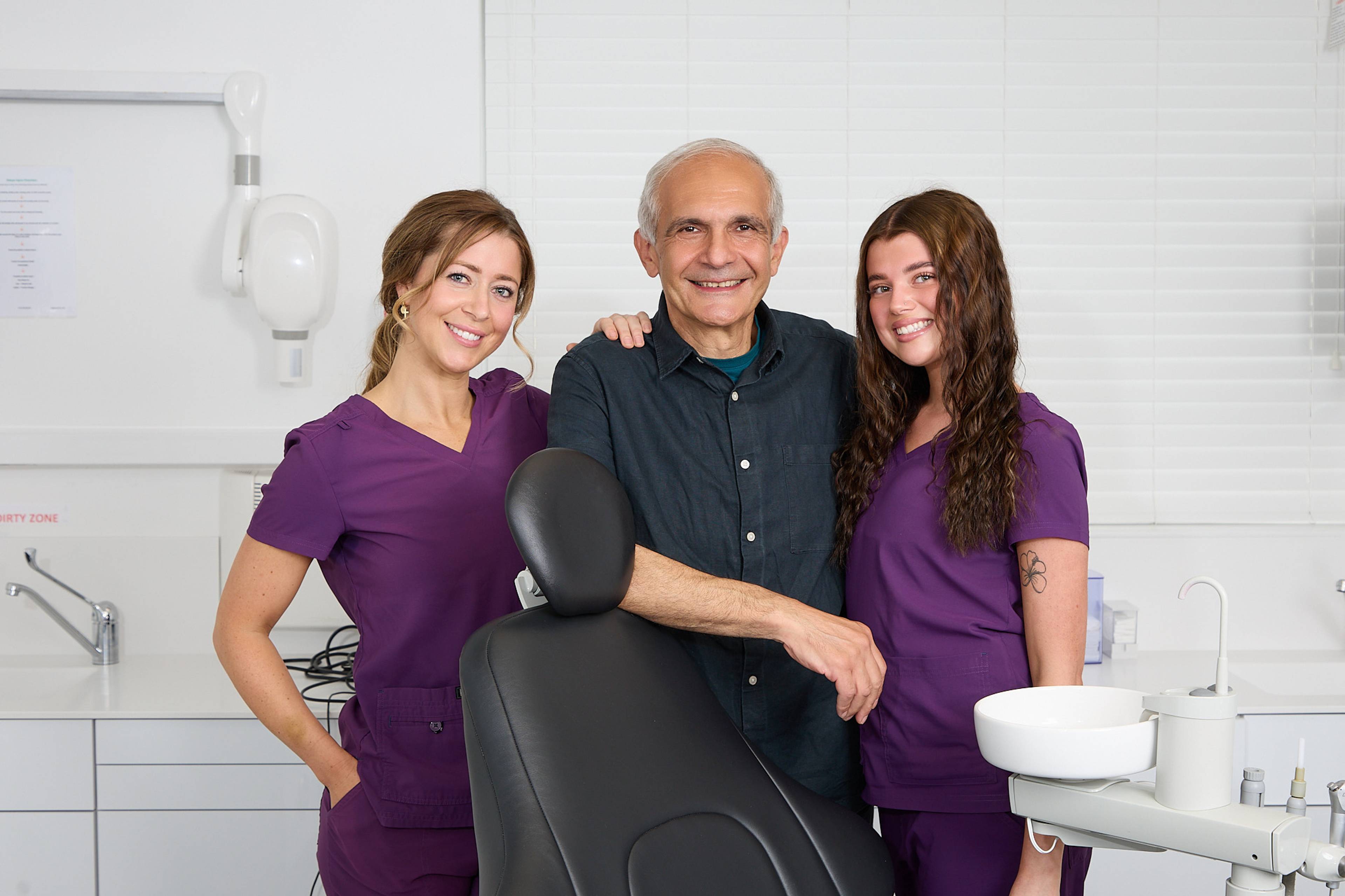 Shahriar Majlessi with two of our dental nurses in a treatment room