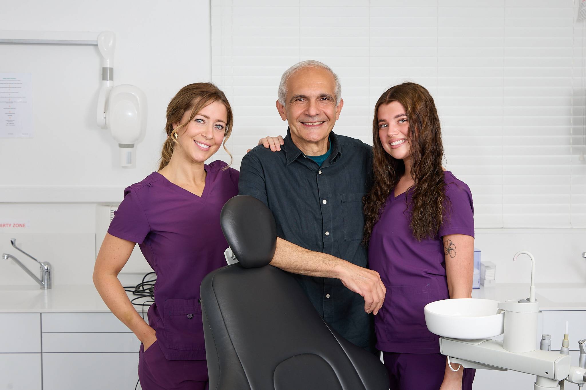 Shahriar Majlessi with two of our dental nurses in a treatment room