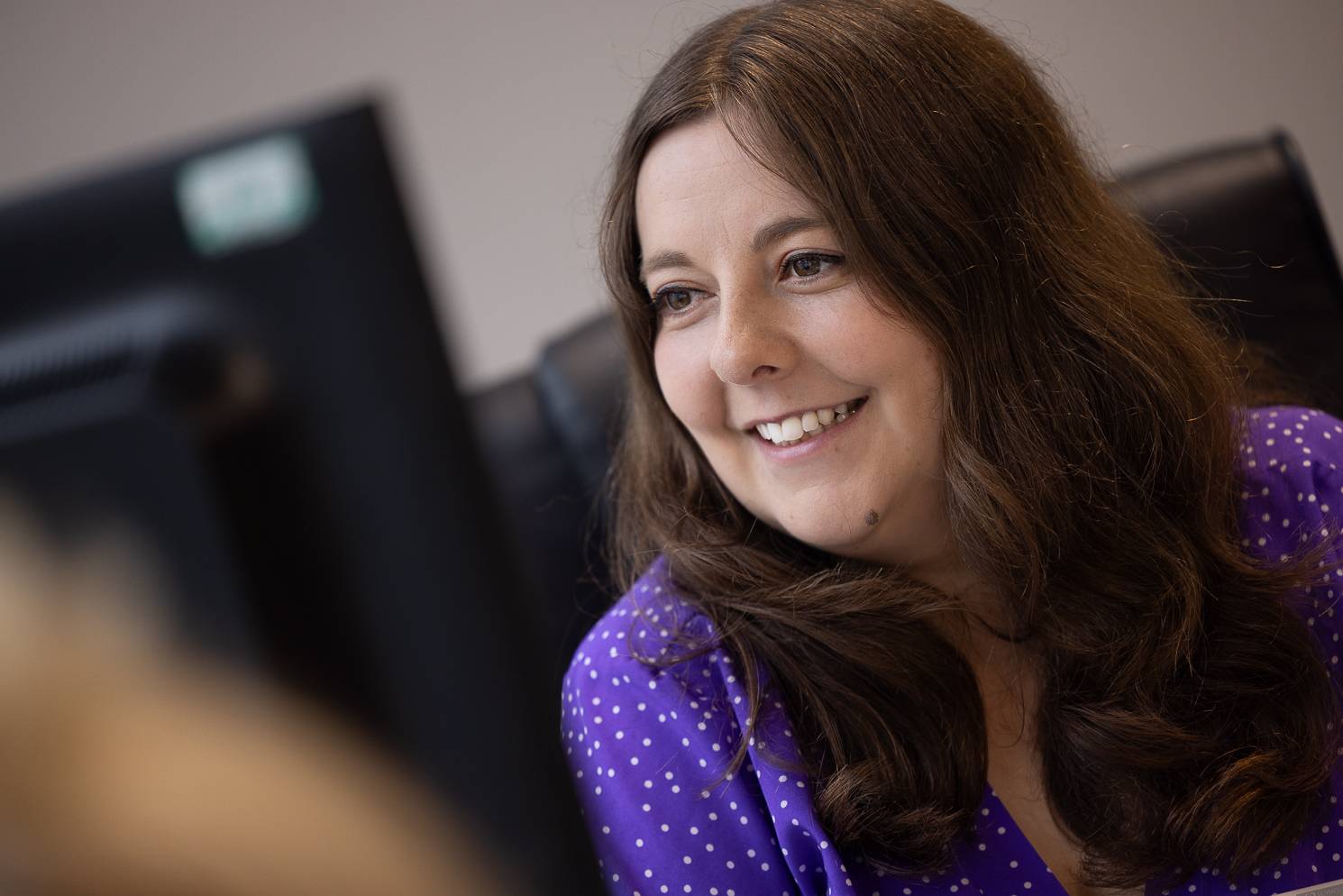 A friendly receptionist at the Plymouth City Centre Dental Practice