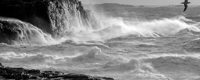 Waves crash onto rocks