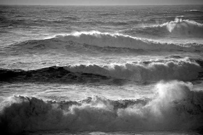 Waves crash in a stormy sea