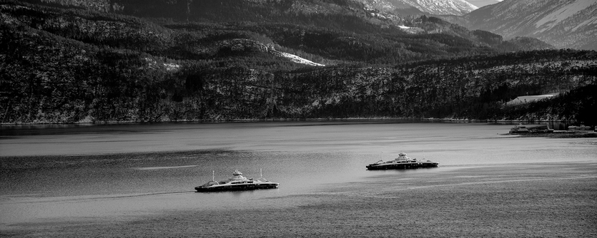 An electric ferry on a fjord