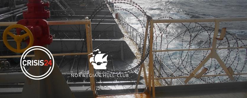 A vessel furnished with anti-piracy measures including razor wire