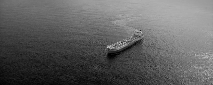 A large tanker vessel is seen from high above