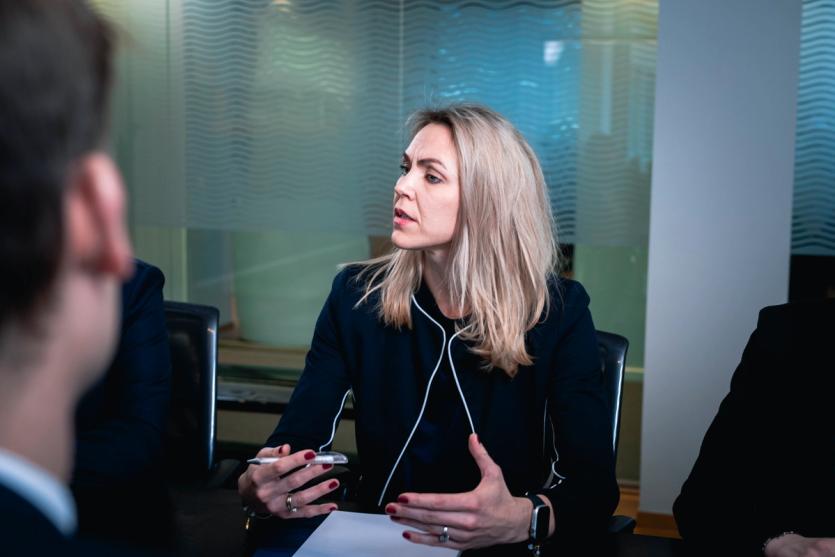 Underwriter in a meeting