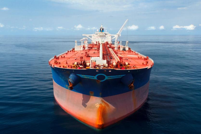 A large tanker vessel is seen from the fore