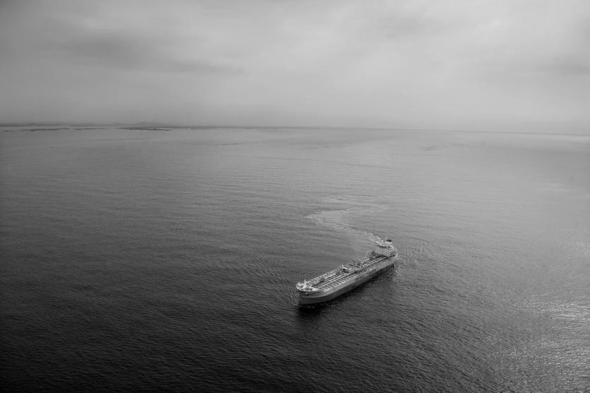A large tanker vessel is seen from high above