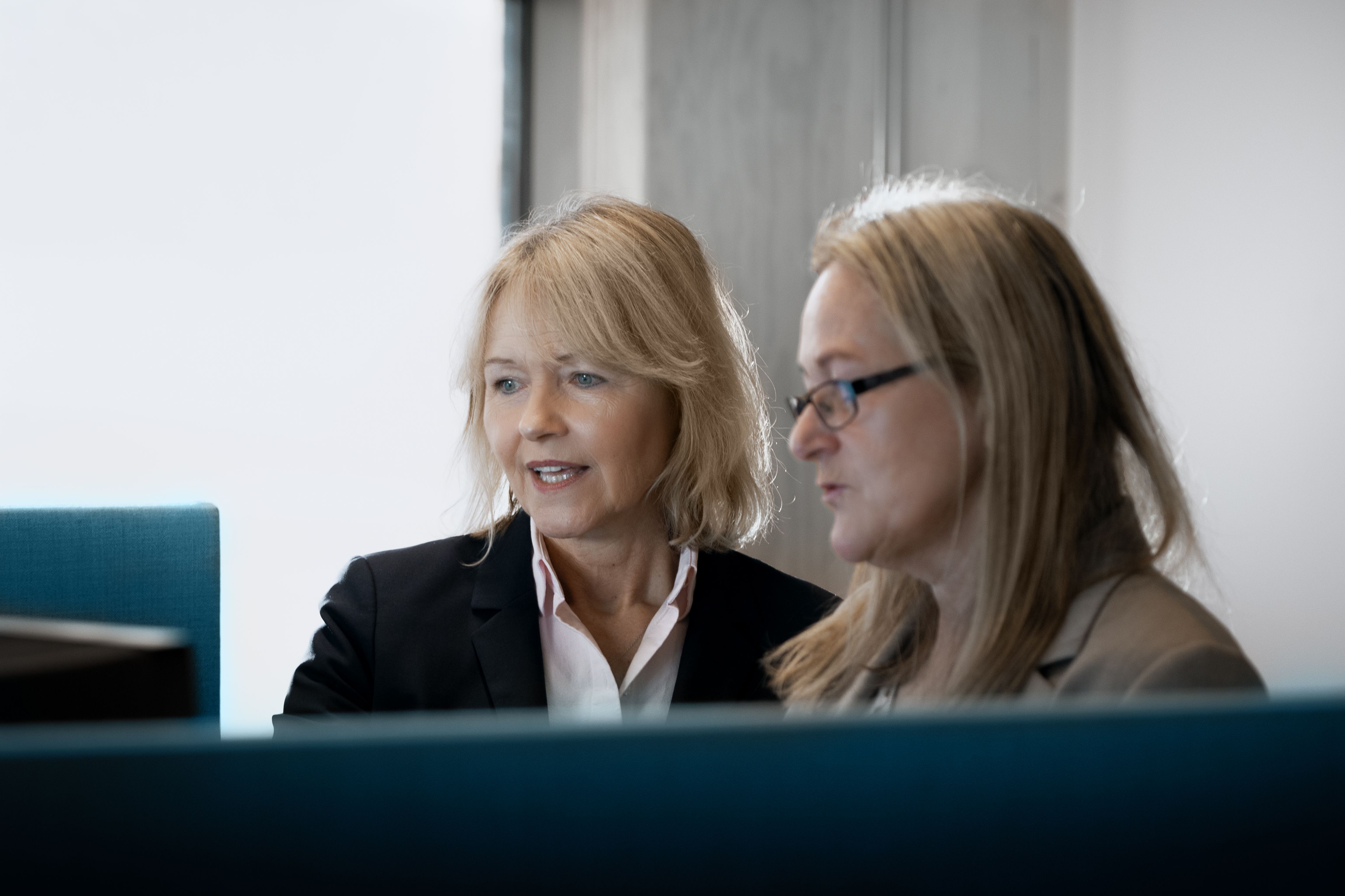 Colleagues working at The Club
