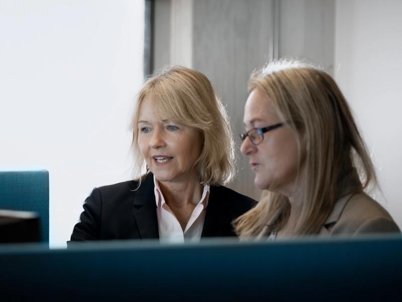 Colleagues working at The Club