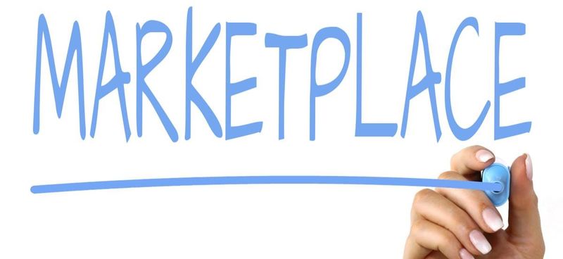 The words Marketplace typed on a whiteboard.
