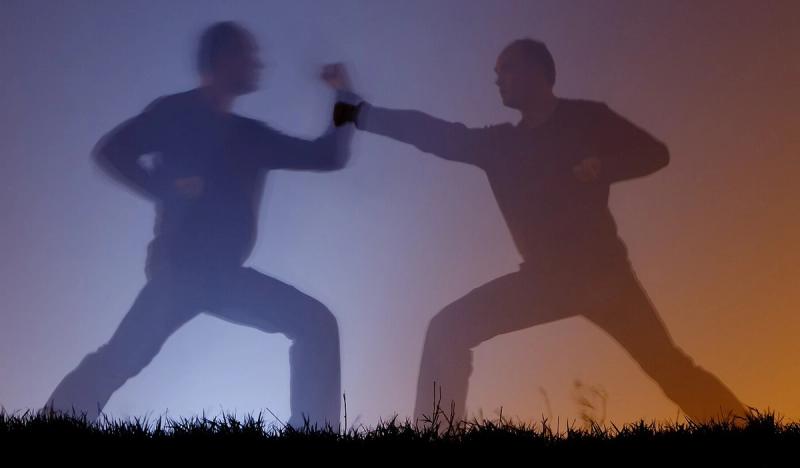 A person doing shadow boxing indicating Competitiveness in the context of this article.