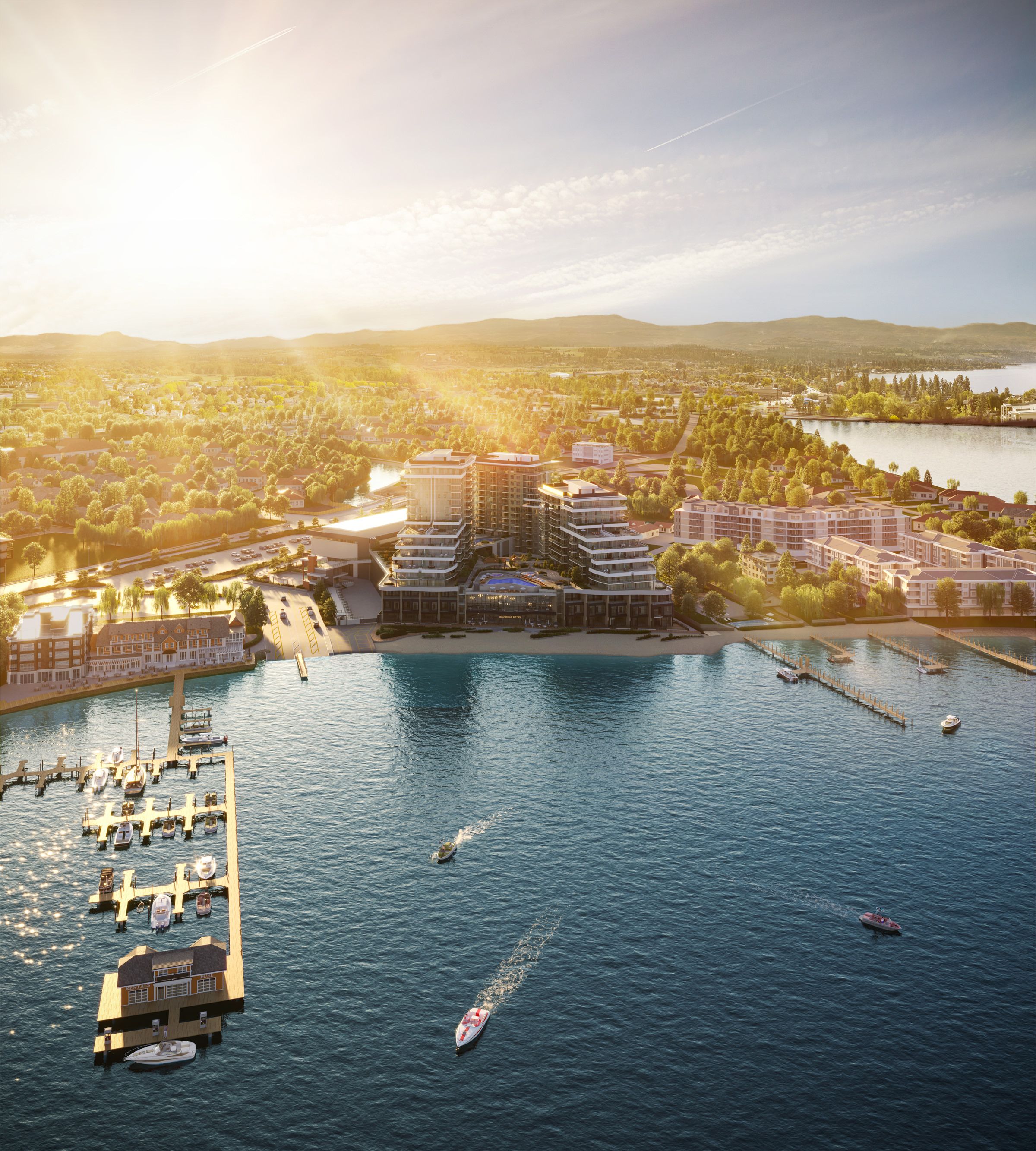 Aerial rendering of Värra Thermal's waterfront building on Okanagan Lake in Kelowna, with a marina and boats in the foreground and hills beyond.