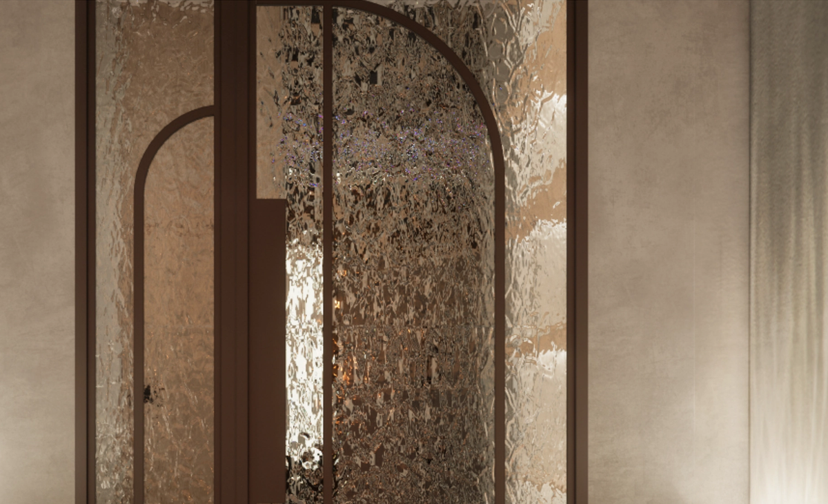 Close-up of arched, bronze-framed doors with textured glass, softly lit from behind.