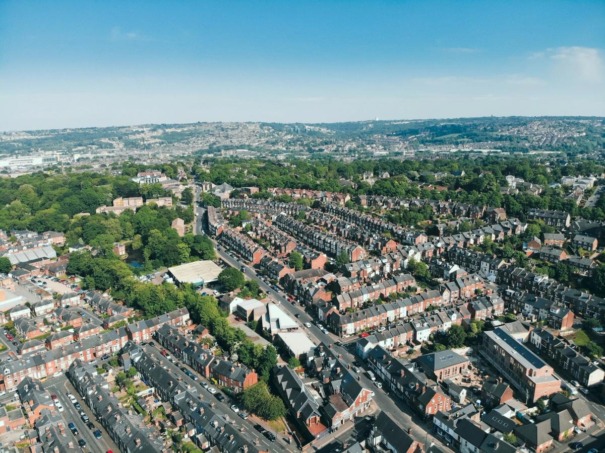 Aerial view of houses and streets in Sheffield in summer