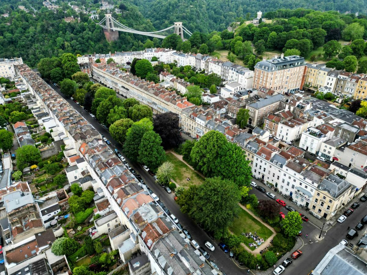 Aerial view of Clifton in Bristol, with the Clifton Suspension Bridge behind