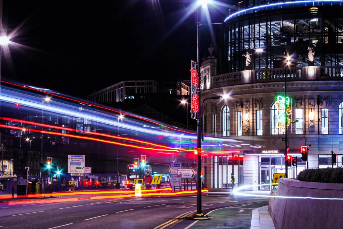 Leeds city centre at night, with light trails from traffic