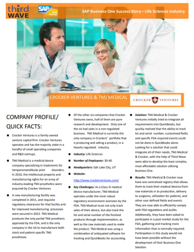 Three medical professionals in white coats discuss documents at a table in a bright office.