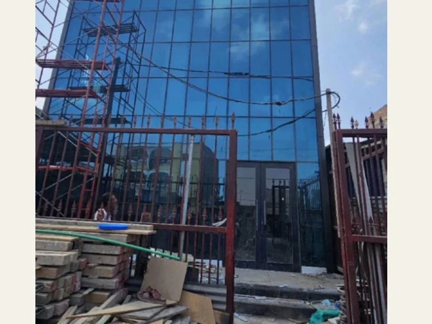 Glazed facade during construction of the CAC Bank PK12 branch
