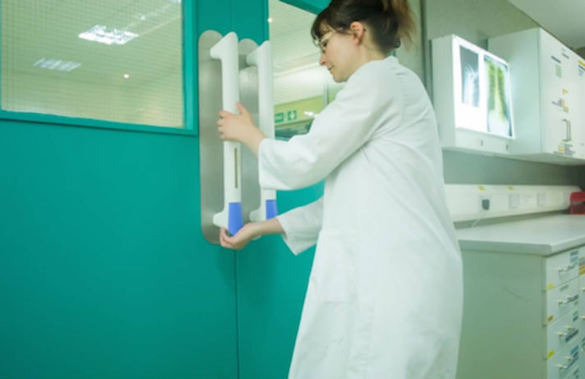 Hand-cleaning door combats disease