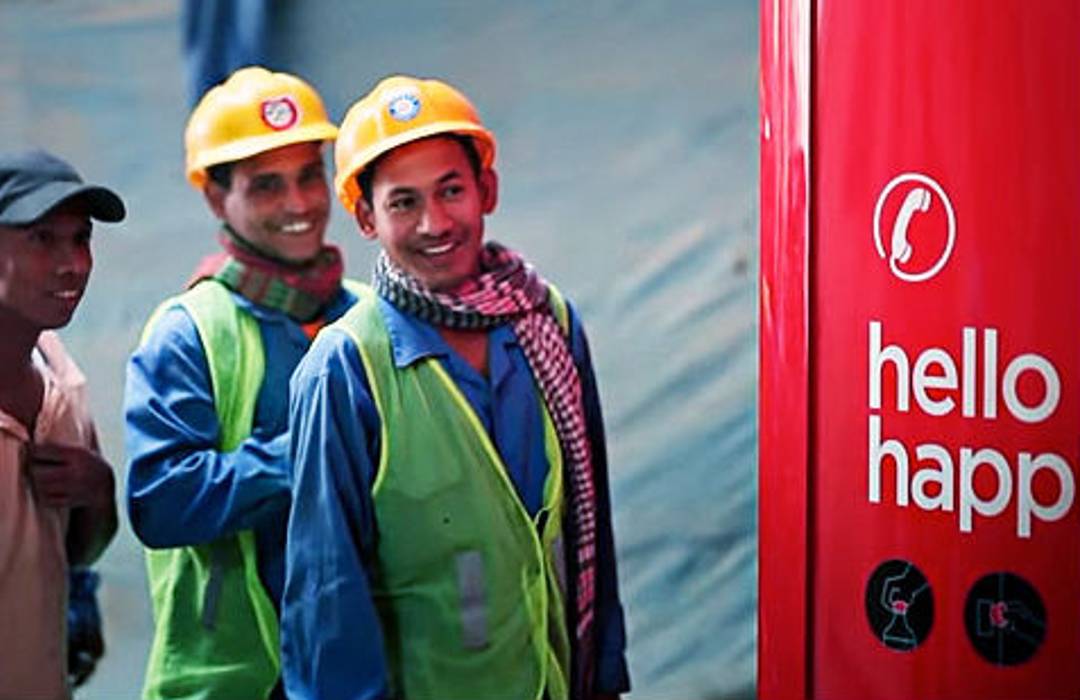 Dubai labourers call home with a Coke