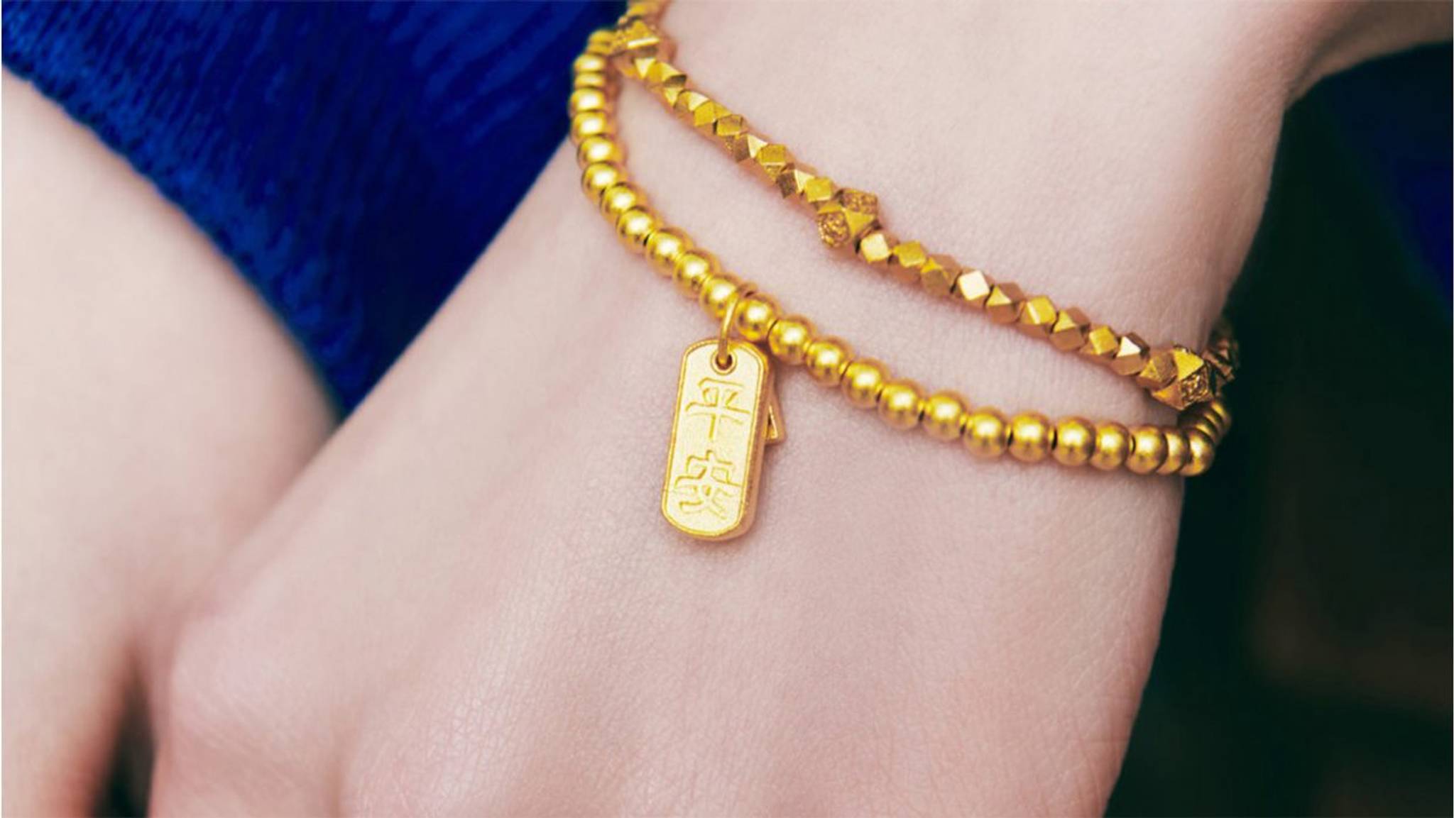 Young Chinese pay homage to heritage through gold