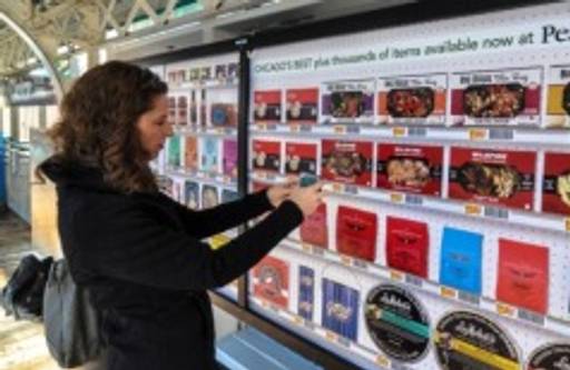 Virtual grocery stores at stations