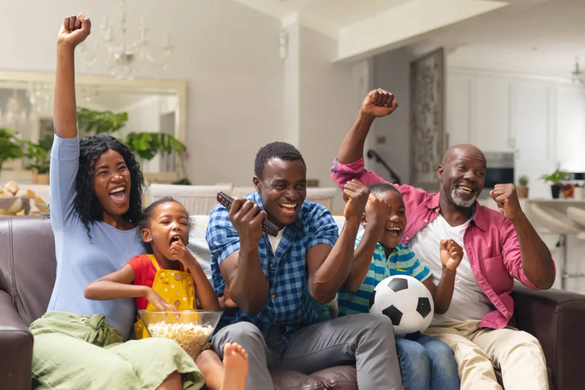 How are families watching sports at home?